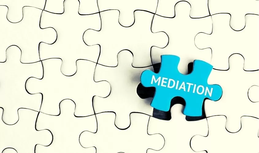Puzzle pieces with one blue one saying meditation