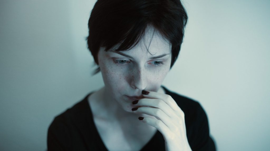 Women sad and stressed.