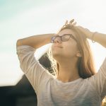 Women outdoors showing signs of relief.