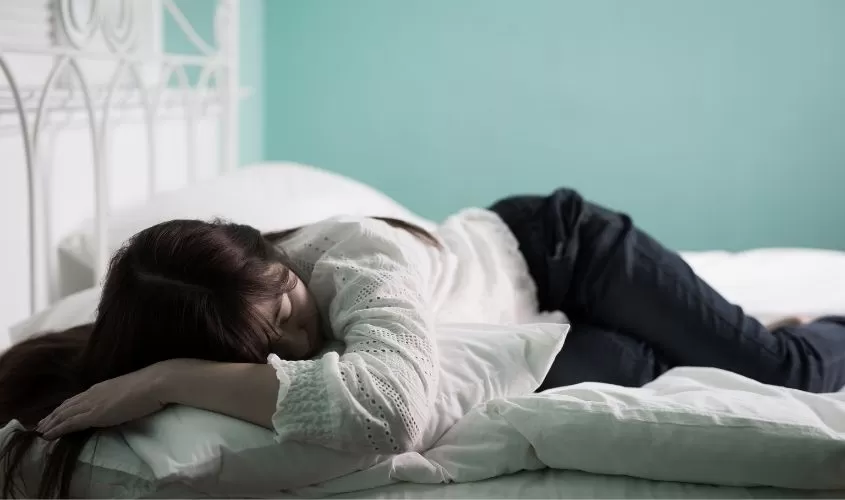 Woman sleeping in bed