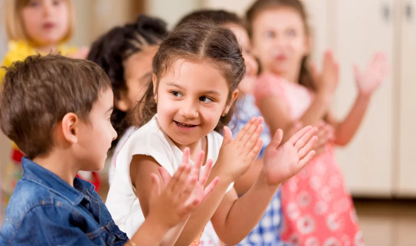 Children clapping