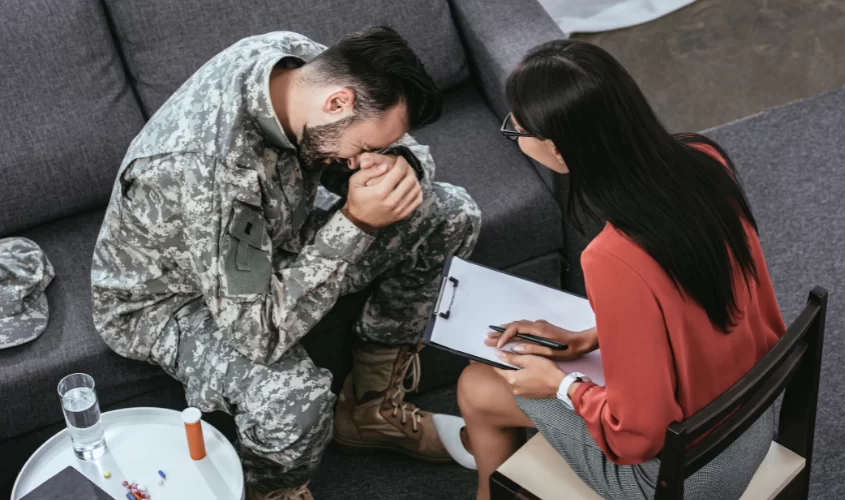Military workers talking to a therapist, having a hard time