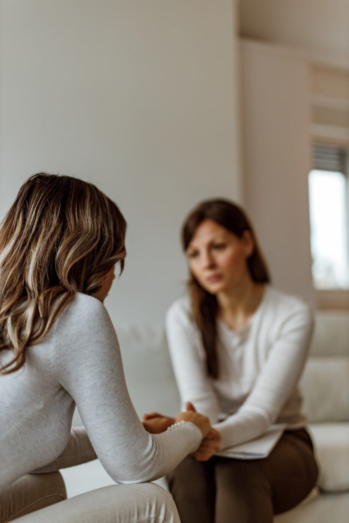 Female patient talking to her female therapist