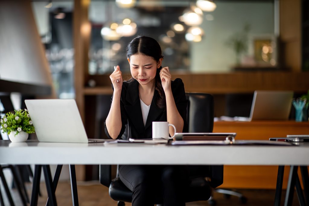 Shot,Of,Asian,Young,Businesswoman,Looking,Stressed,While,Sitting,In