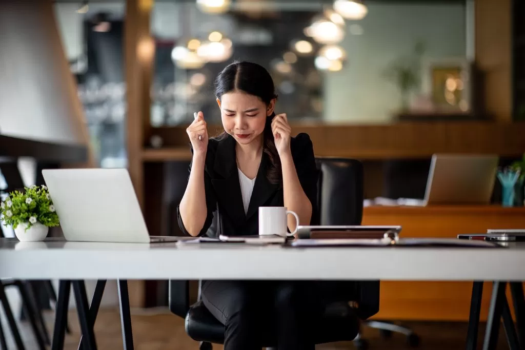 Shot,Of,Asian,Young,Businesswoman,Looking,Stressed,While,Sitting,In