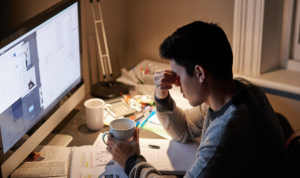 University student studying late at night.