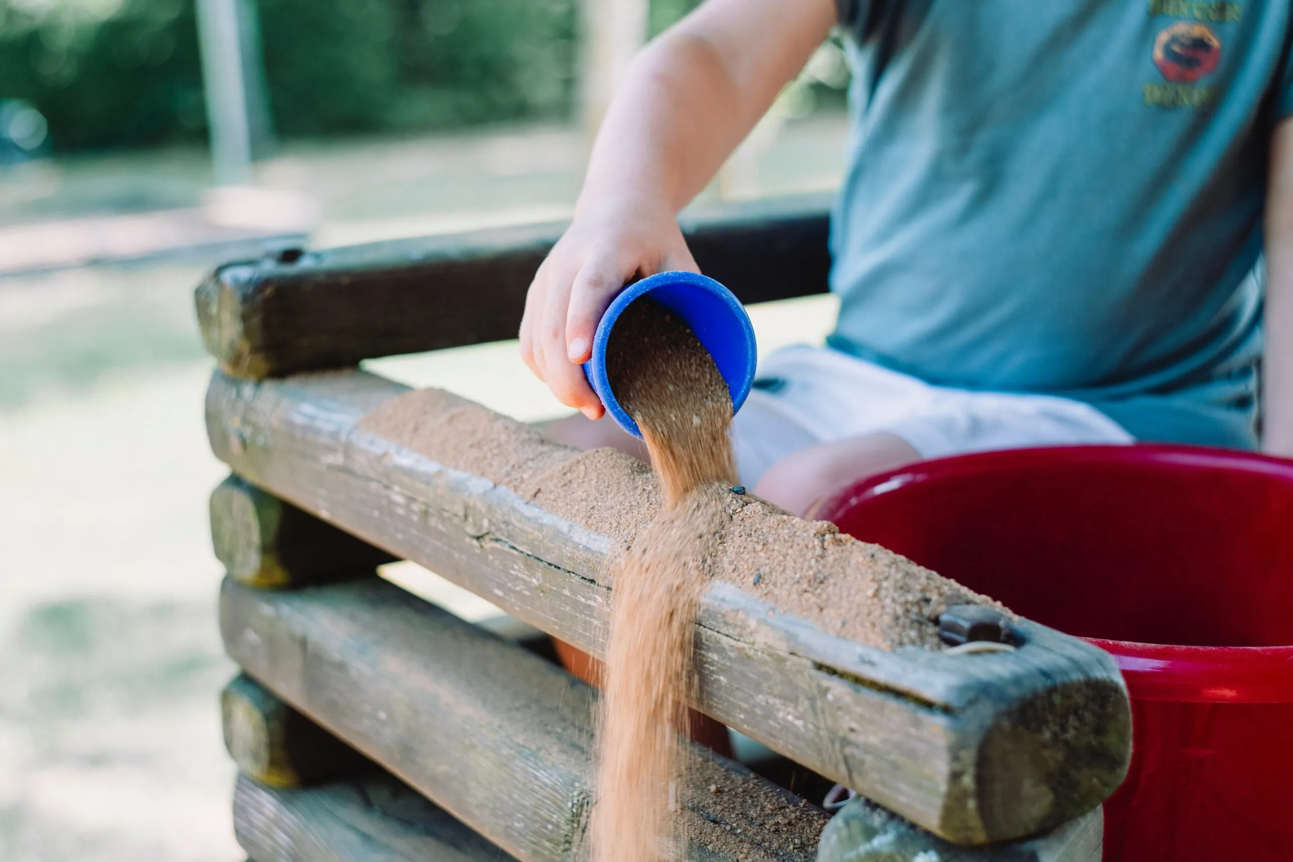 Child Playing in a sandbox