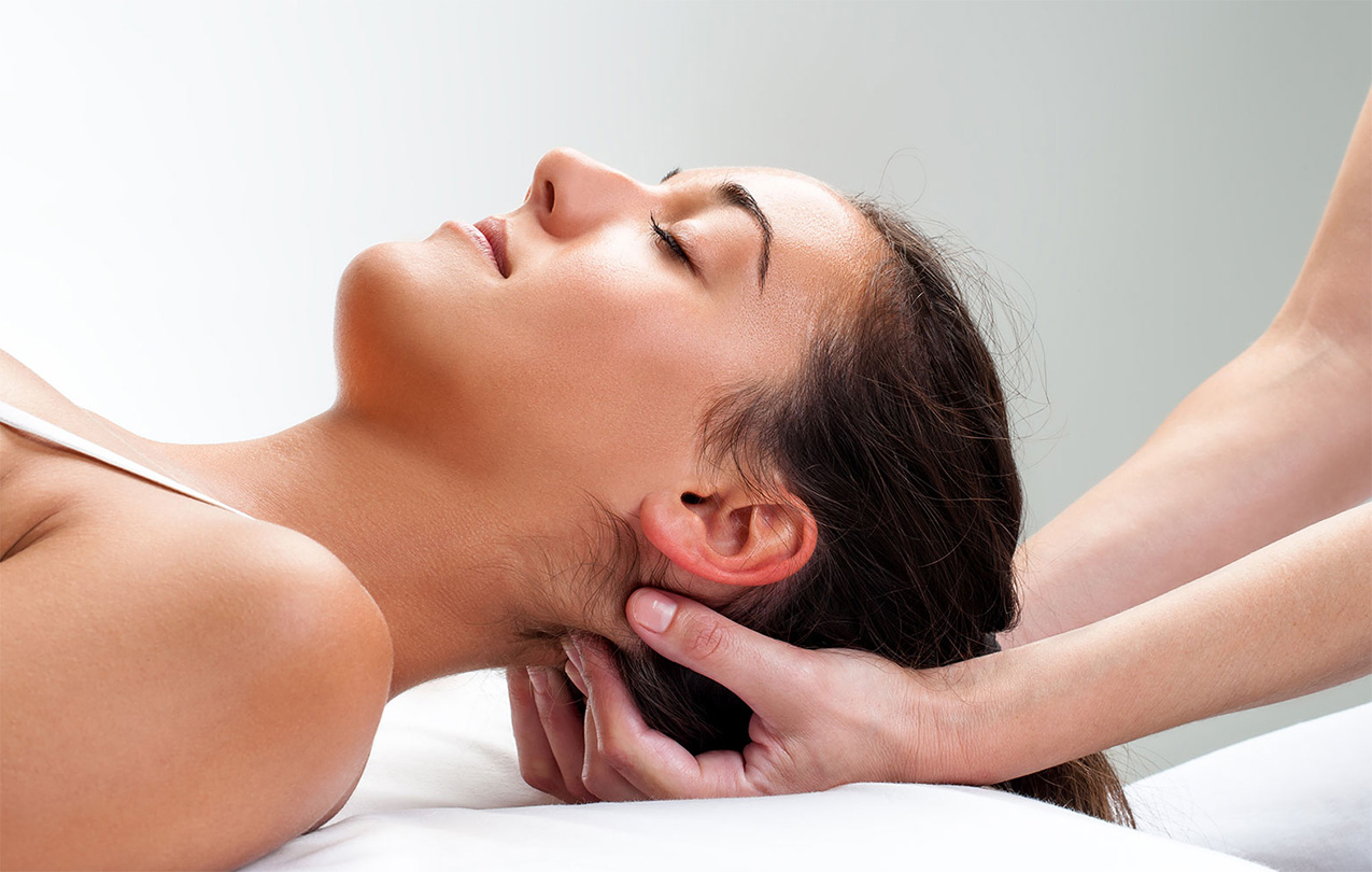 Woman receiving a craniosacral massage